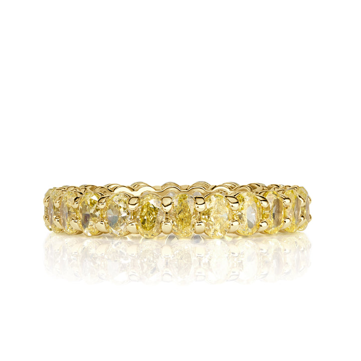 3.79ct Fancy Yellow Oval Cut Lab Lab Diamond Eternity Band in 18k Yellow Gold