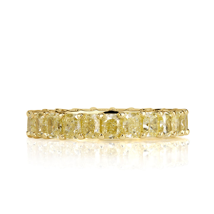 4.46ct Fancy Yellow Radiant Cut Lab Lab Diamond Eternity Band in 18K Yellow Gold